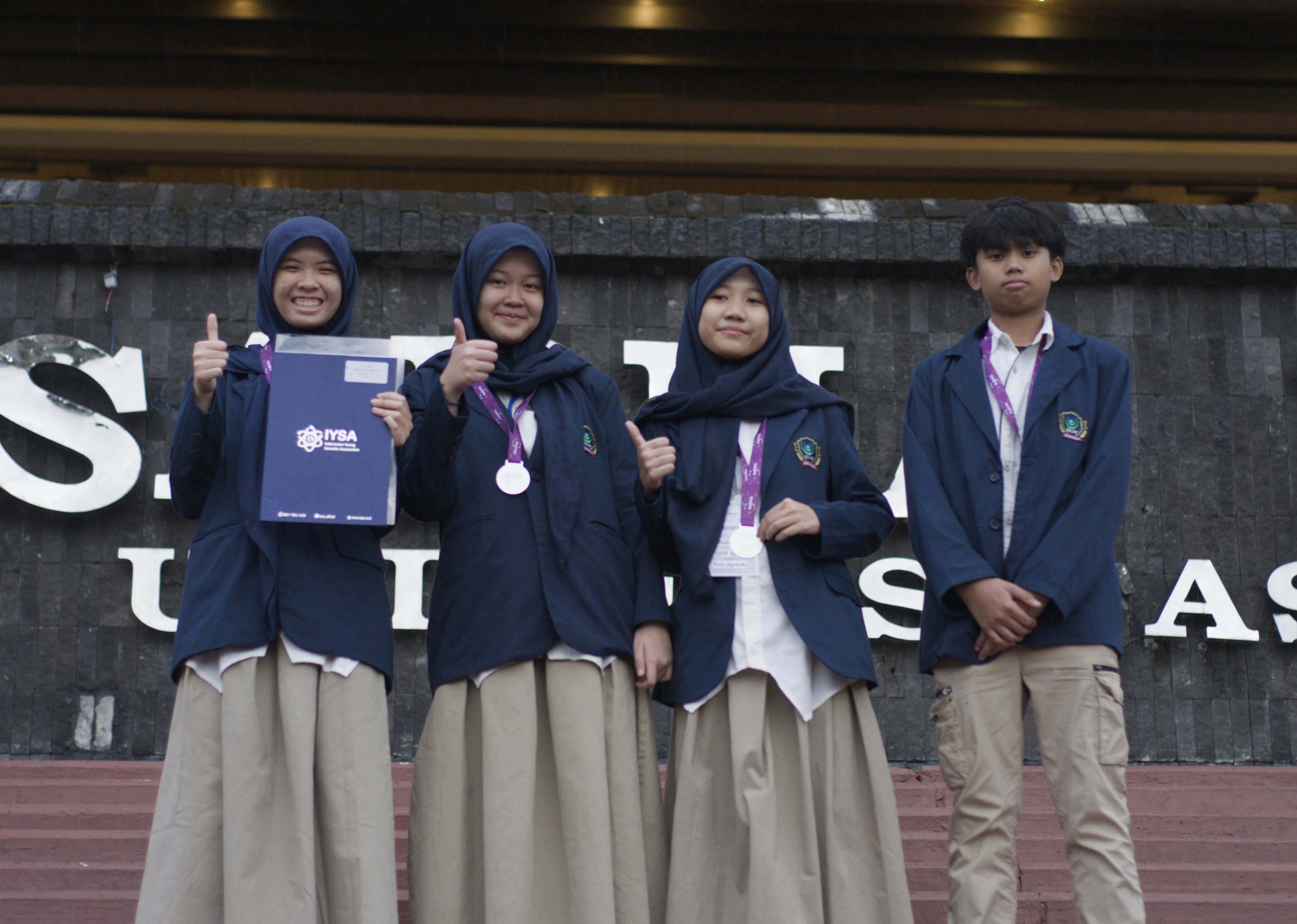 Children aged 8–12 learning coding